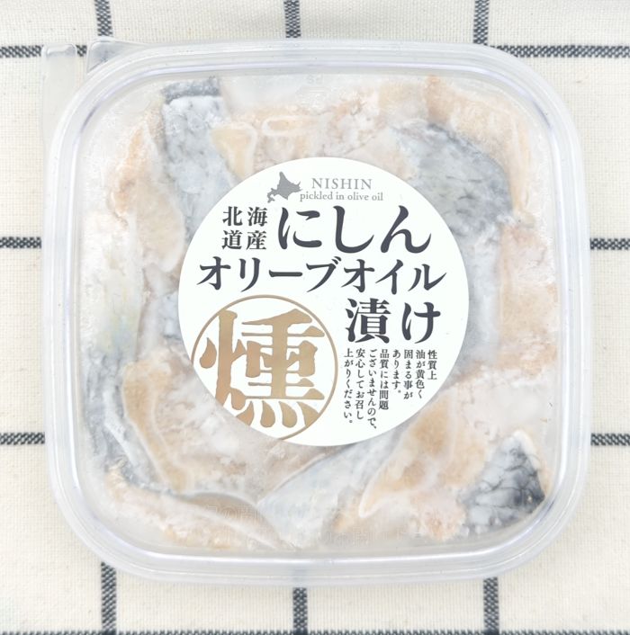 「にしんオリーブオイル漬け（燻製風味）」のパッケージ上部（商品ラベル）